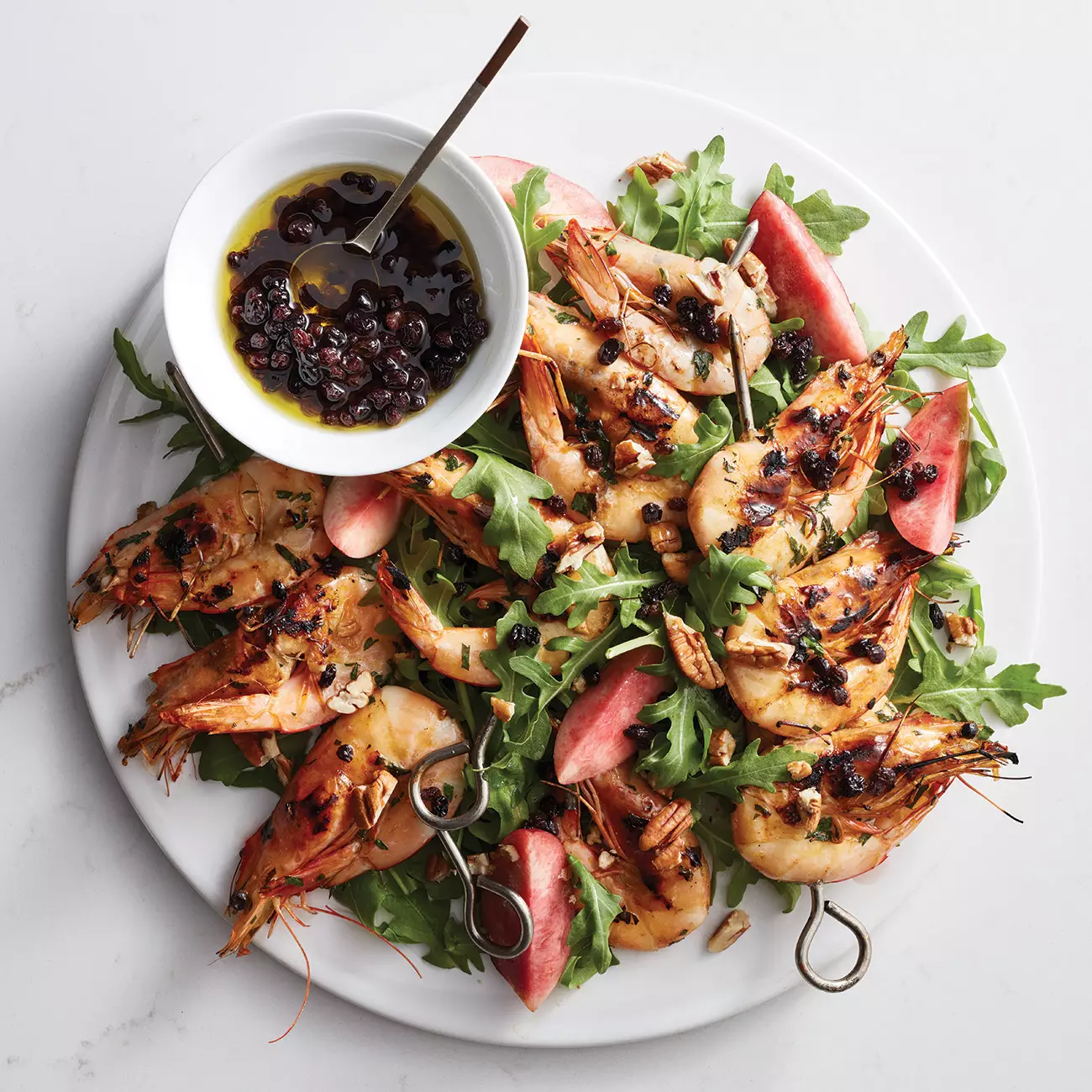Nikki P's barbecued prawn skewers with nectarine salad Woolworths